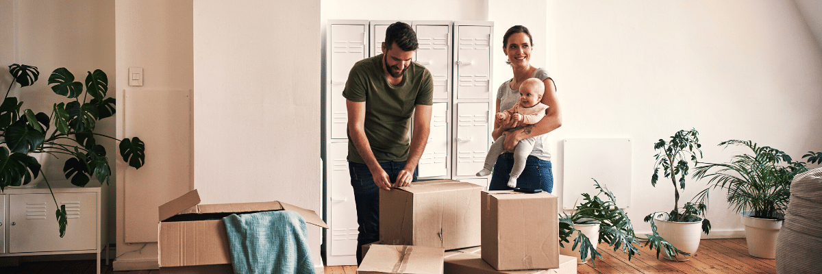 Couple with baby moving into new home